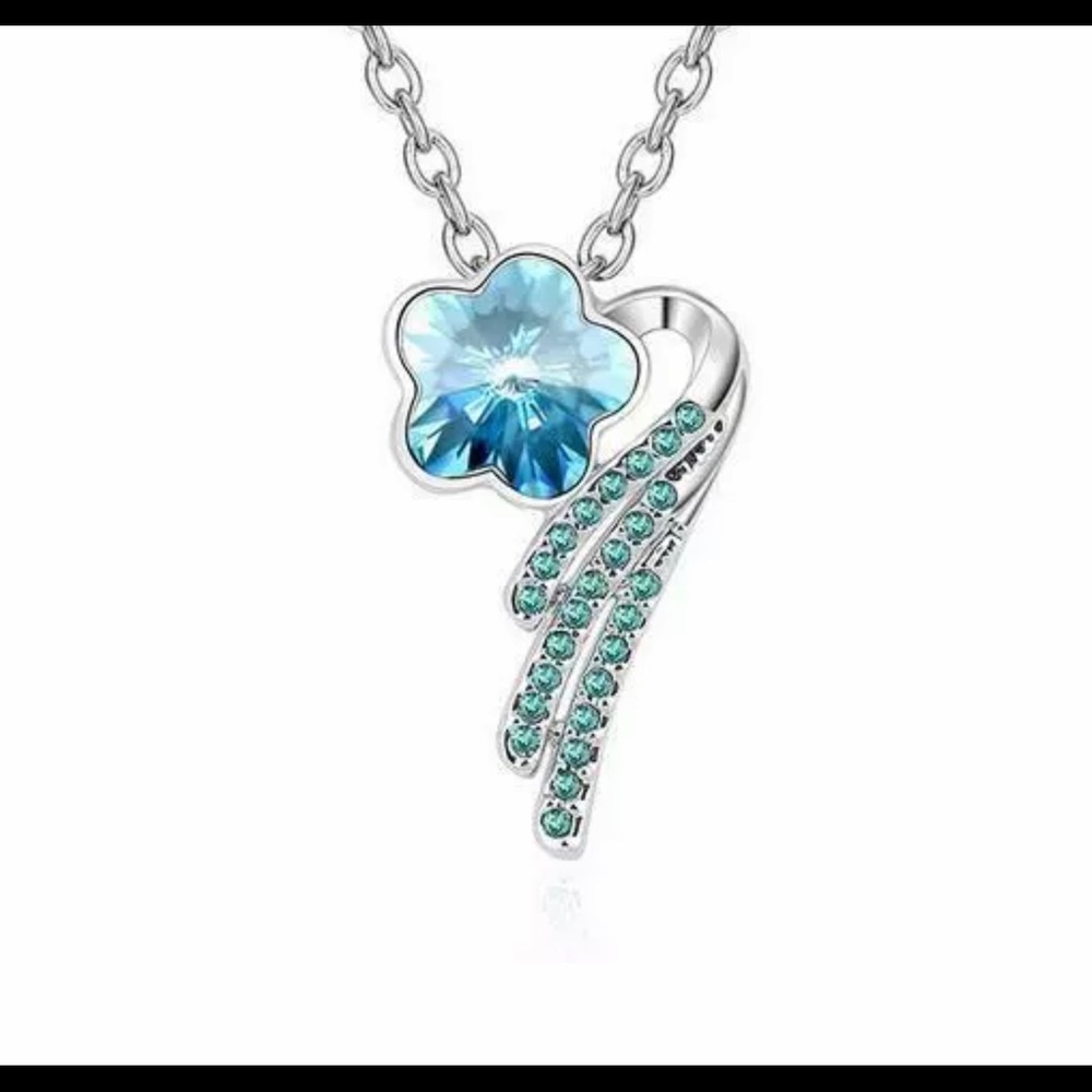 Silver necklace with blue shooting star pendant